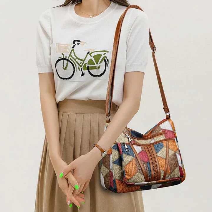 Bolso de mano de piel con mosaico